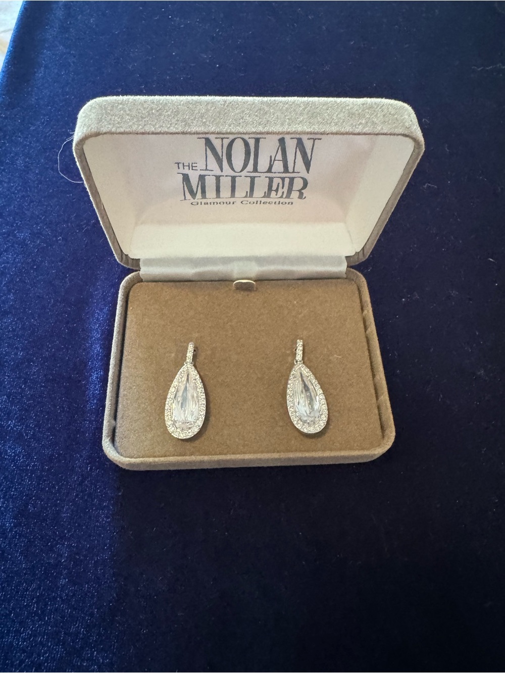 Nolan Miller Clear Crystal Teardrop Earrings in Silver Tone